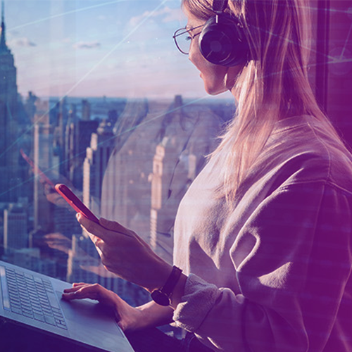 woman on a phone overlooking city